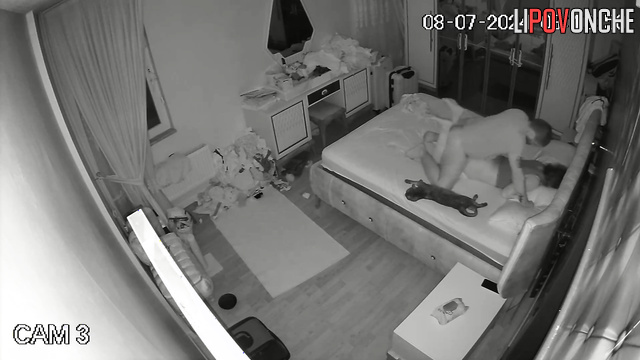 A husband warms up his wife's vagina to insert his long cock into it