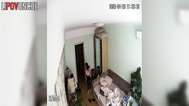 After checking that no one was home, the curly-haired beauty started masturbating