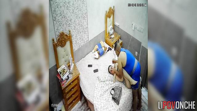 Husband pulls his big-assed wife to the edge of the bed to fuck her