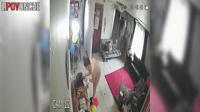 A bustling naked mommy browses her phone while shaking her breasts