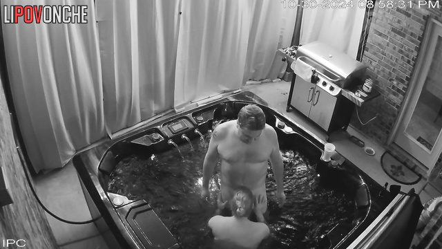 A man films himself fucking a chubby blonde in a jacuzzi on his phone