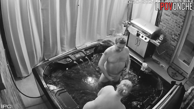 A man films himself fucking a chubby blonde in a jacuzzi on his phone