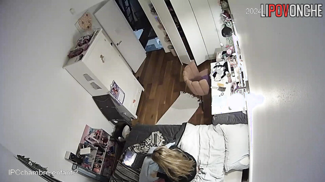 Young blonde cums from a soft toy, ignoring her relatives in the hallway