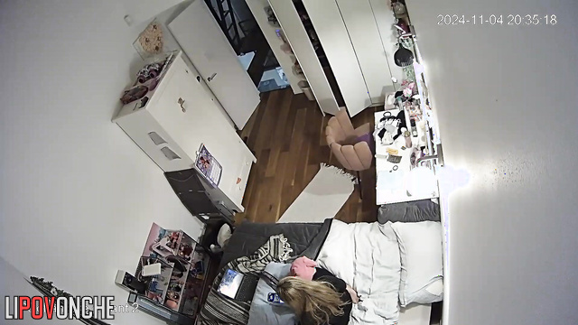 Young blonde cums from a soft toy, ignoring her relatives in the hallway