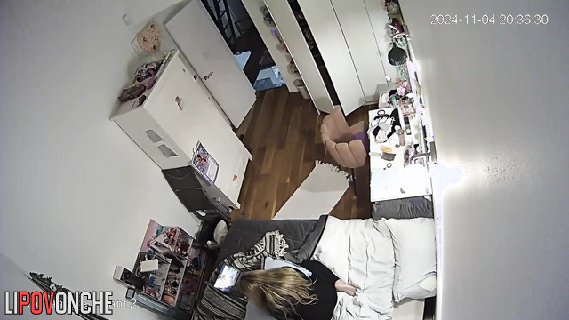 Young blonde cums from a soft toy, ignoring her relatives in the hallway