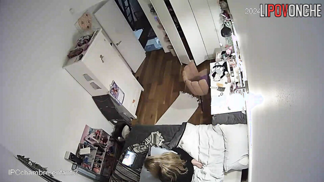 Young blonde cums from a soft toy, ignoring her relatives in the hallway