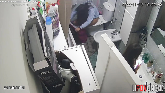 Two seductive sisters take turns peeing in the toilet in front of each other