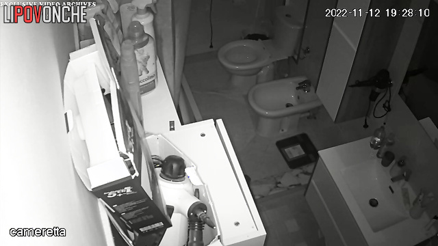 Two seductive sisters take turns peeing in the toilet in front of each other