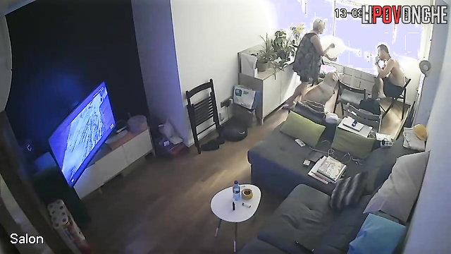 Pregnant mommy with big tits walks around in panties in front of guests