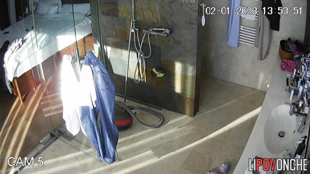 A gorgeous milf languidly wipes her seductive body after a shower