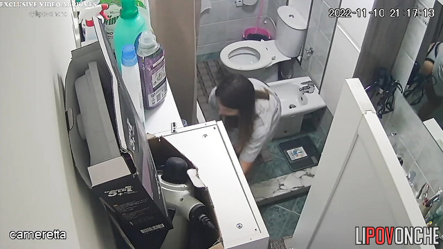 A seductive beauty with an inviting butt takes off her sexy panties to pee