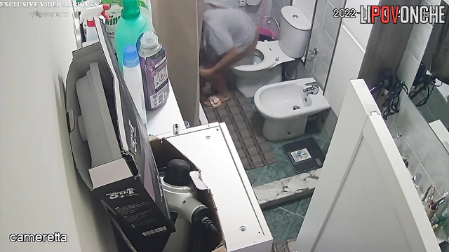 A seductive beauty with an inviting butt takes off her sexy panties to pee