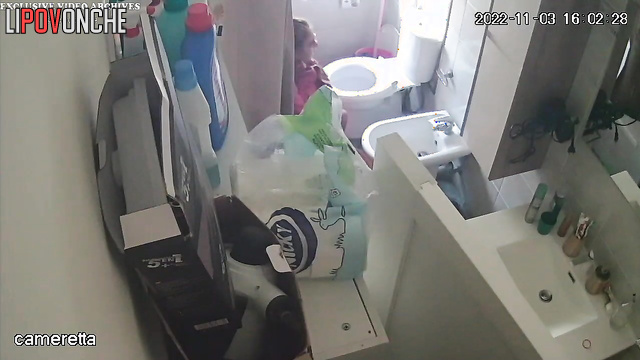 A tender cutie languidly undresses her sister with a hairy pussy for a shower