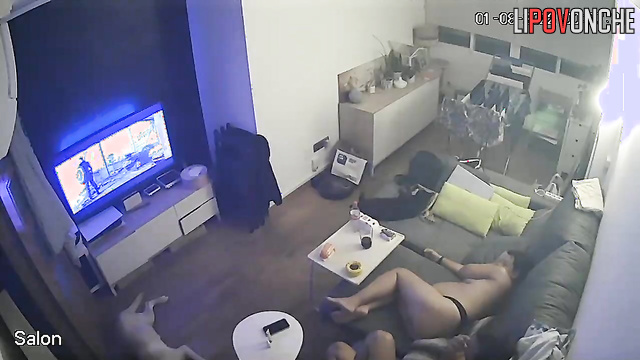 Pregnant beauty watches a new movie wearing only thin panties