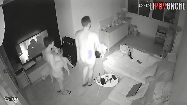 A seductive pregnant mom with big nipples on her sexy tits watches TV naked