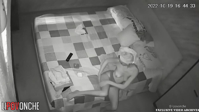 A skinny beauty with small tits admires her sexy body in the mirror