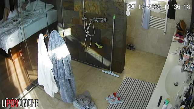 A hidden camera in the bathroom showed a naked seductive teacher with a sexy figure