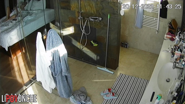 A hidden camera in the bathroom showed a naked seductive teacher with a sexy figure