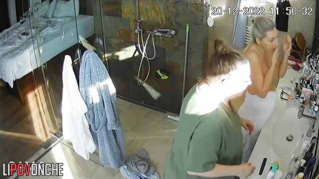 A hidden camera in the bathroom showed a naked seductive teacher with a sexy figure