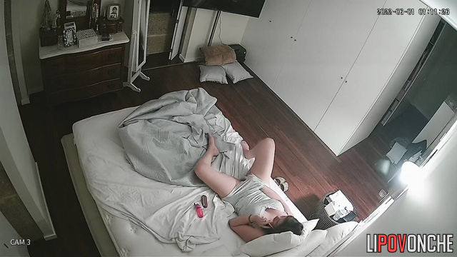 Young babe talking on the phone and touching her pussy