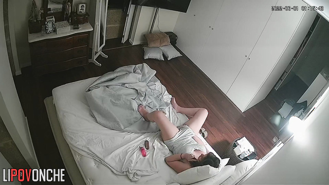 Young babe talking on the phone and touching her pussy