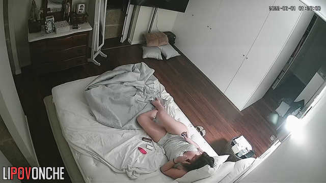 Young babe talking on the phone and touching her pussy