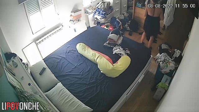 Pregnant lady and her mother are chatting in a room