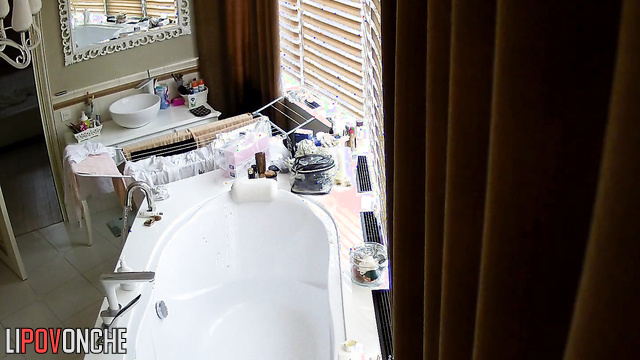 Skinny lady is going to take a bath, hidden camera
