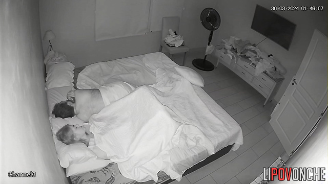 Sexy blonde plays with her hot pussy under the blanket while her husband sleeps