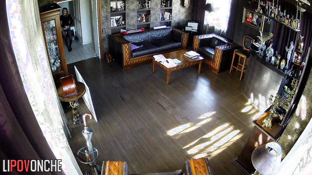 Young skinny beauty dancing alone in the living room