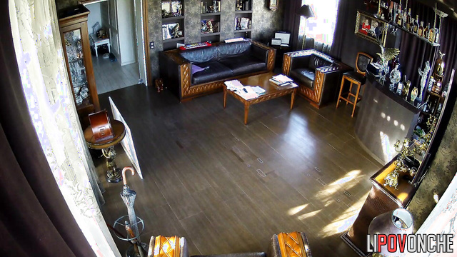 Young skinny beauty dancing alone in the living room