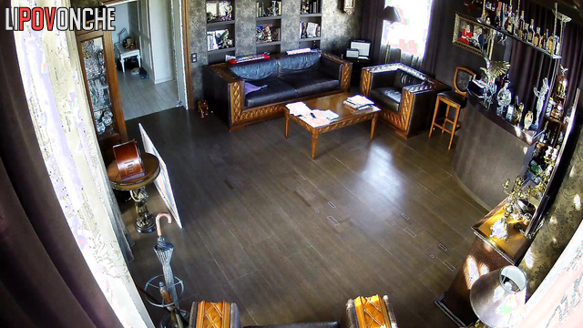 Young skinny beauty dancing alone in the living room