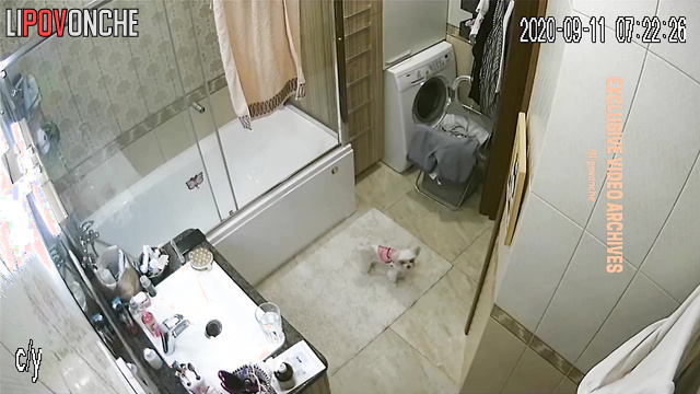 She was getting ready for work in the bathroom, unsuspecting