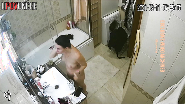She was getting ready for work in the bathroom, unsuspecting