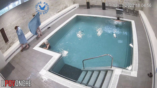 Grannies and milfs swimming together in a public pool (topless)