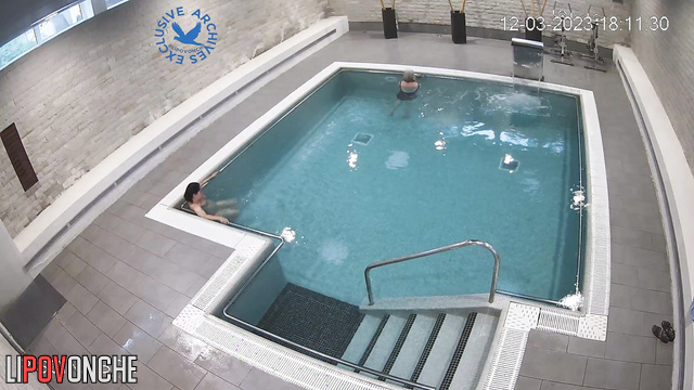 Grannies and milfs swimming together in a public pool (topless)
