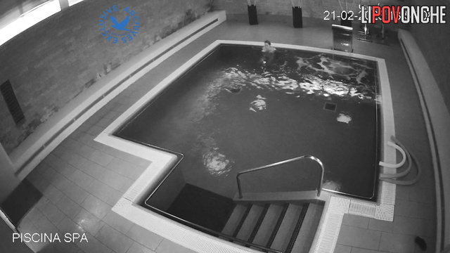 Women chatting and swimming in the public pool, look