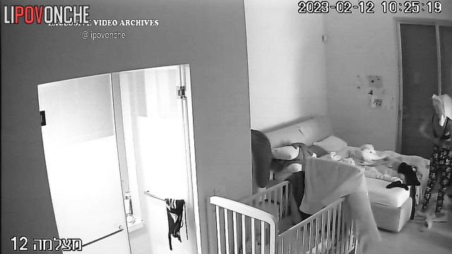 Young mommy gets herself ready for sleeping (video from bedroom)