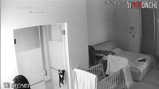Young mommy gets herself ready for sleeping (video from bedroom)