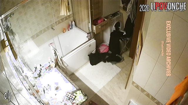 This woman is both sexy in clothes and without [hidden camera in bath]