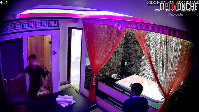 Cute Asian girl gives an elderly client a tongue massage after a shower