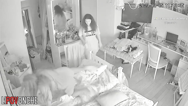 Two bored lesbian girlfriends try on new bras and outfits in their shared bedroom