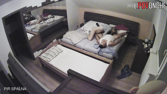 Husband and wife enjoying hot oral sex (as a foreplay)