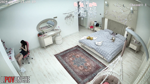 Young girl plays with her pussy while talking on the phone