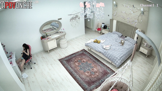 Young girl plays with her pussy while talking on the phone