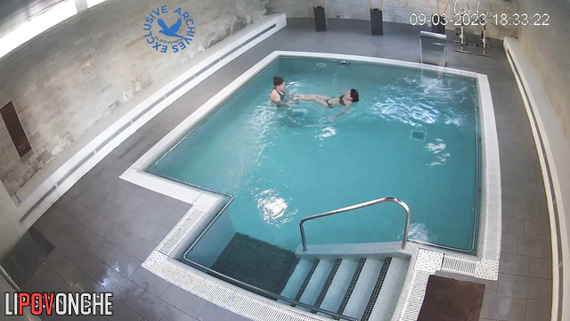 Swimming people were filmed in a public pool, look
