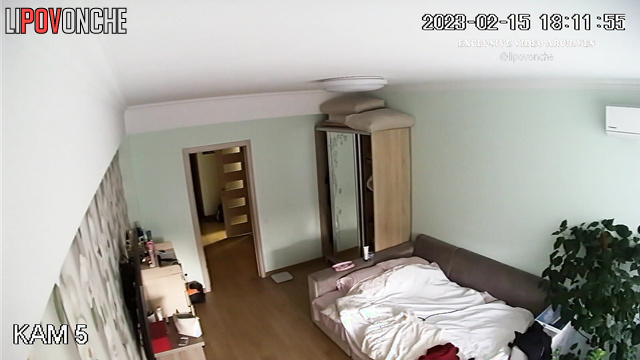 Couple kissing gently in the bedroom (she is in underwear)