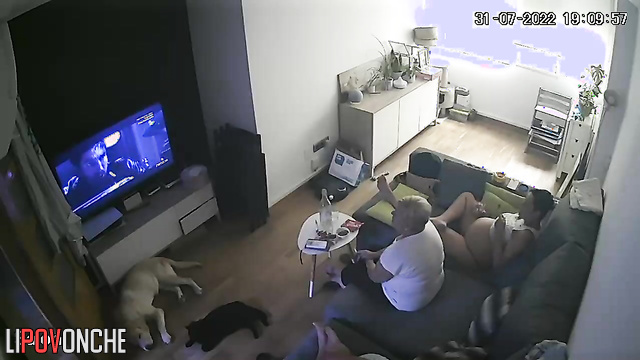 Friends chilling in the living room & watching tv