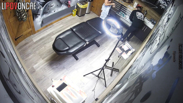 Video from tattoo salon from hidden video camera showing nice angle